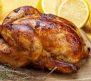 06 Dec 2007 --- A whole grilled chicken with lemons and sprig of thyme --- Image by © MacGregor, Stuart/the food passionates/Corbis